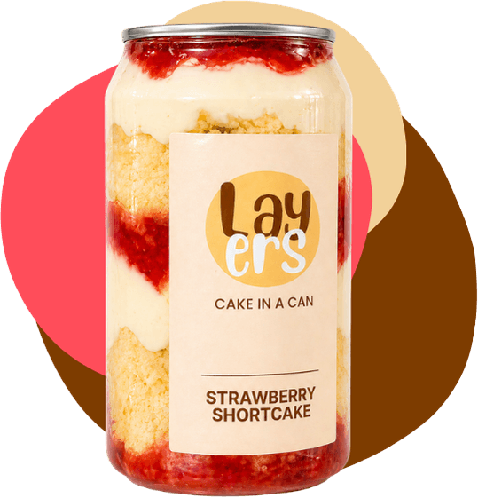 A Layers strawberry shortcake can, showing its layers of sponge, cream and strawberry